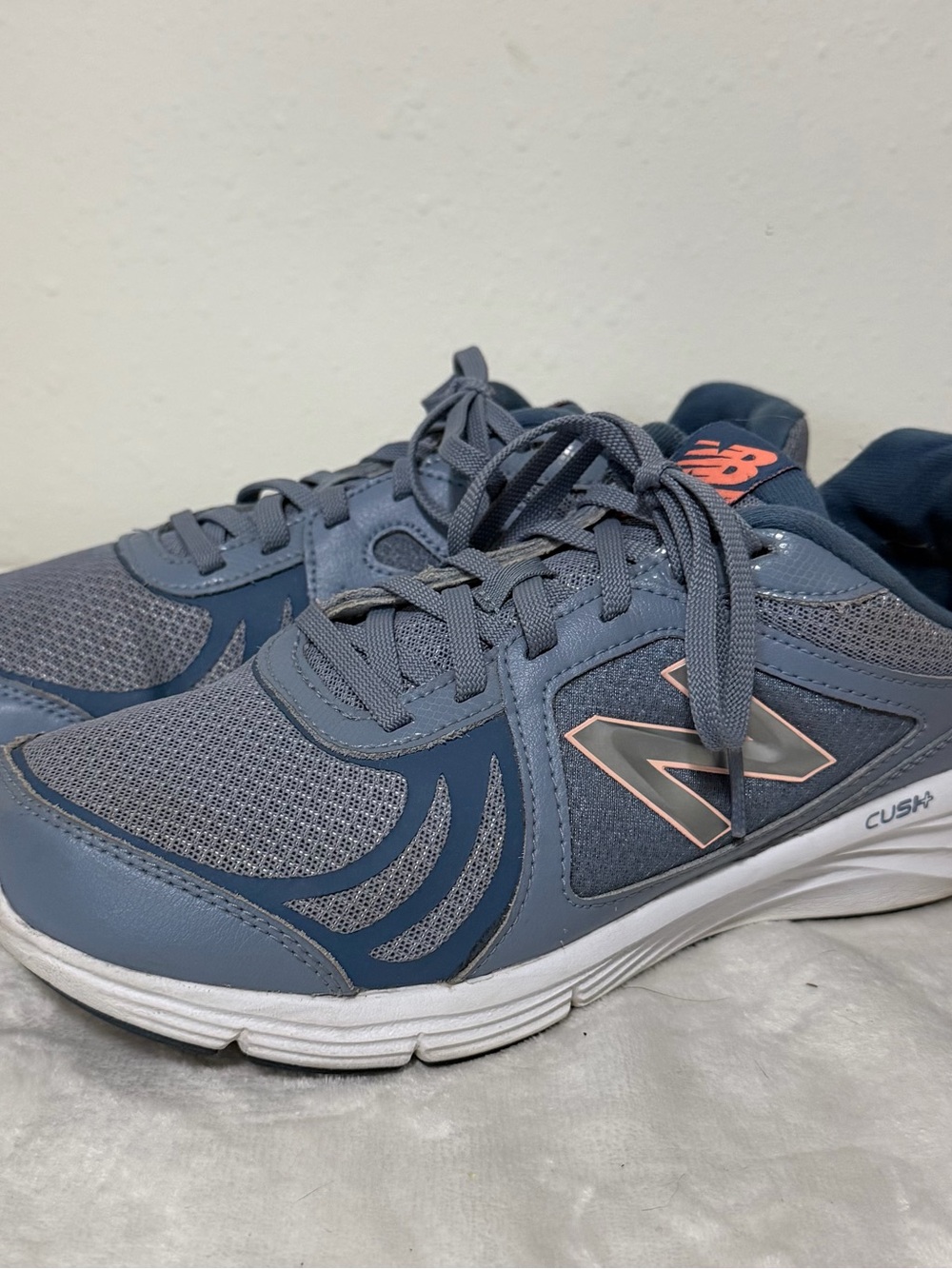 New Balance Women's Navy Athletic Shoes with Pink Logo Accent